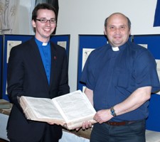 The Rev Dr Stanley Gamble, speaker, and the Rev Alan Irwin who organised the KJV Display and services, looking at one of the old bibles on display in St Patrick's, Ballymena.